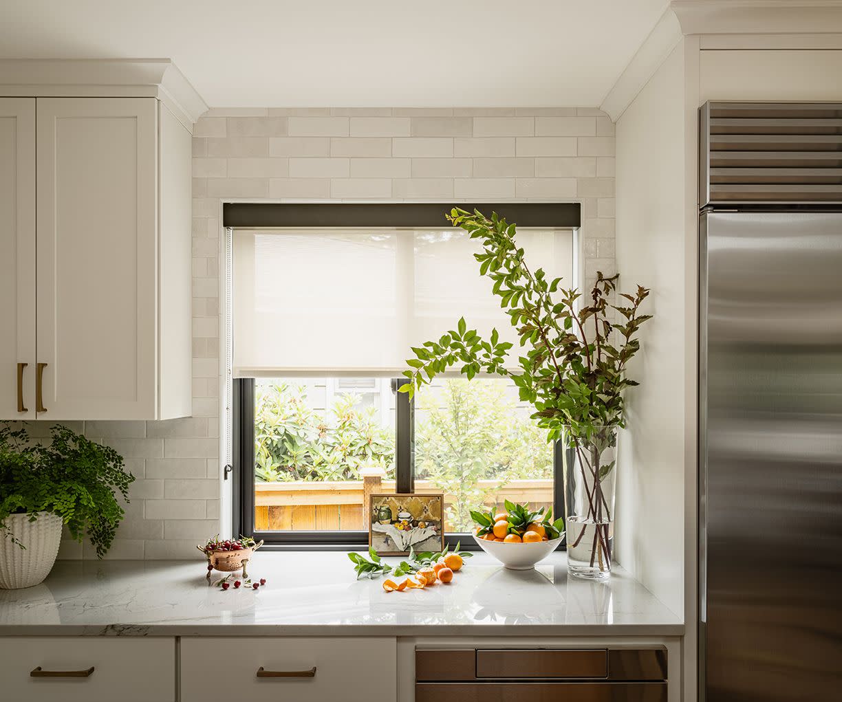 a kitchen with a large window