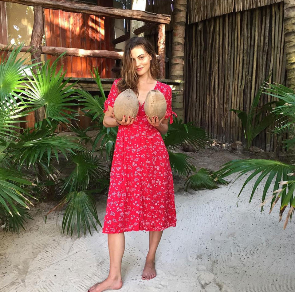 <p><em>Vampire Diares'</em> Phoebe Tonkin has some coconuts to share in this tropical snap. </p>