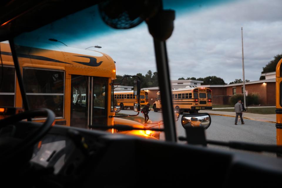 Busses line up for morning drop off at McKean High School on Thursday, Oct. 10, 2019. Across the state, transportation officials feel their departments are underinvested in.