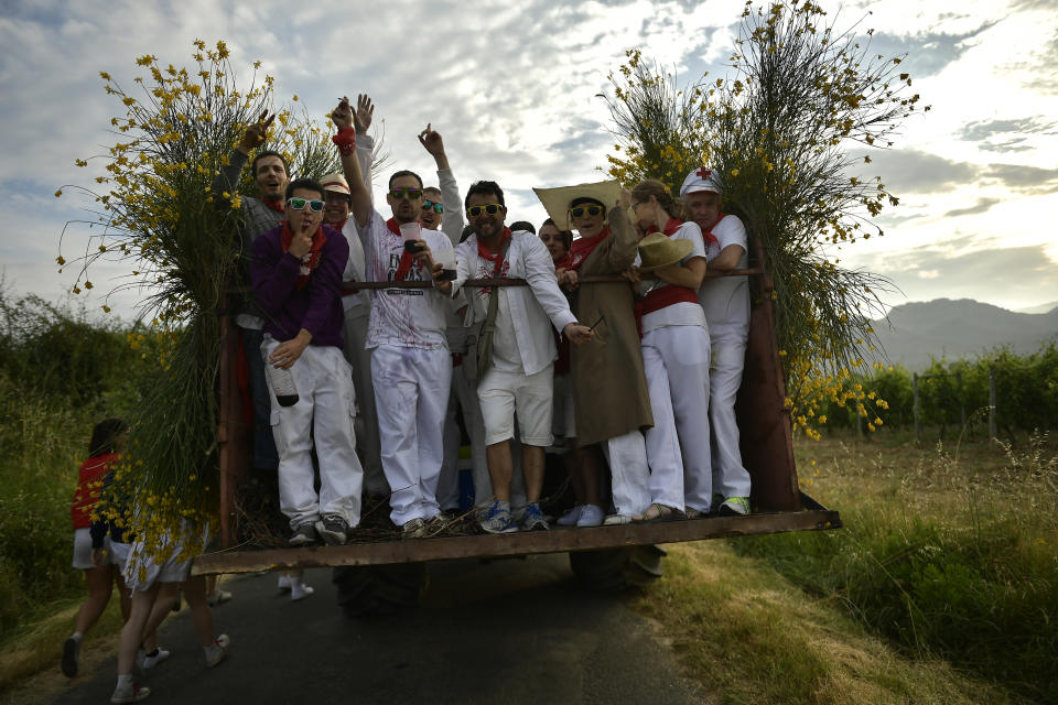 <p>People arrive to take part in a wine battle, in the small village of Haro, northern Spain, Friday, June 29, 2018. (Photo: Alvaro Barrientos/AP) </p>