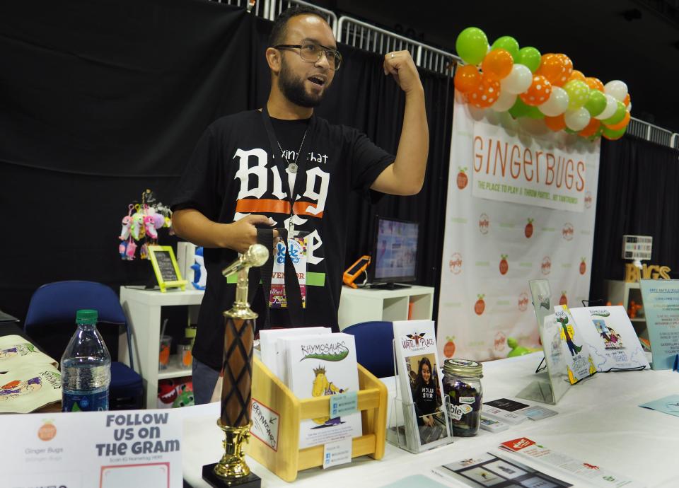 07/20/2019Author Orlando Molina selling his Rhymosaurs books during the 2nd annual Kidz Expo on Saturday held at the Stockton Arena.CALIXTRO ROMIAS/THE RECORD