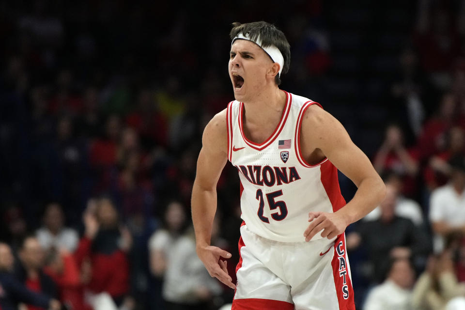 Arizona guard Kerr Kriisa reacts after a basket during the first half of an NCAA college basketball game against Oregon, Thursday, Feb. 2, 2023, in Tucson, Ariz. (AP Photo/Rick Scuteri)