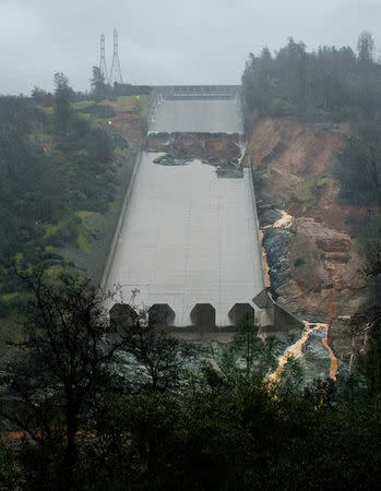 The area of erosion on the lower half of the Oroville Dam spillway is seen after overnight test flows in Oroville, California, U.S. February 9, 2017. California Department of Water Resources/Kelly Grow/Handout via REUTERS