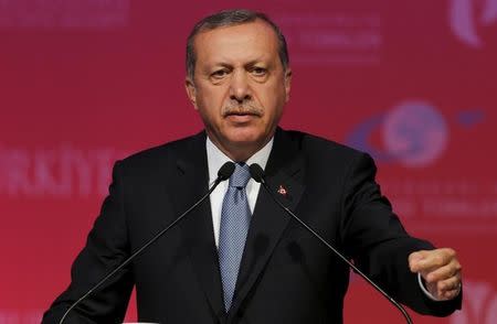 Turkey's President Tayyip Erdogan makes a speech during a graduation ceremony in Ankara, Turkey, June 11, 2015.