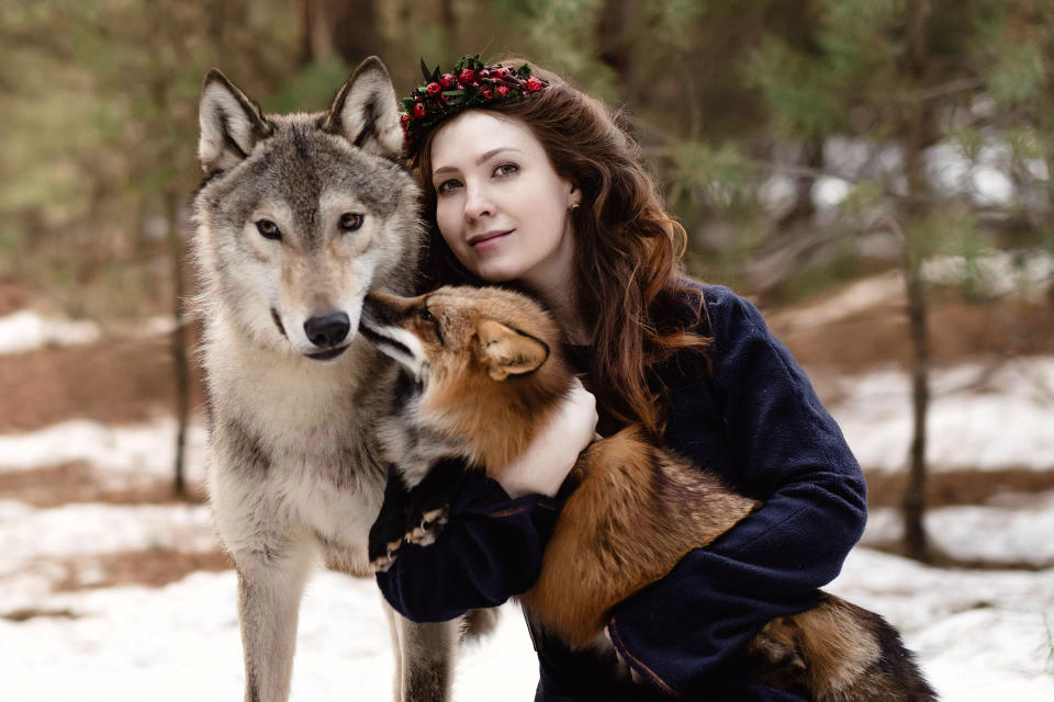 Ira with a wolf and a fox