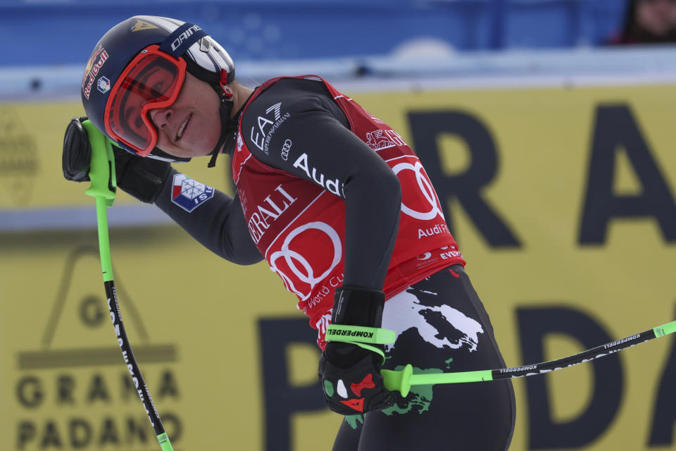 Italy's Sofia Goggia gets to the finish area after completing an alpine ski, women's World Cup downhill race, in Cortina d'Ampezzo, Italy, Friday, Jan. 20, 2023. (AP Photo/Alessandro Trovati)