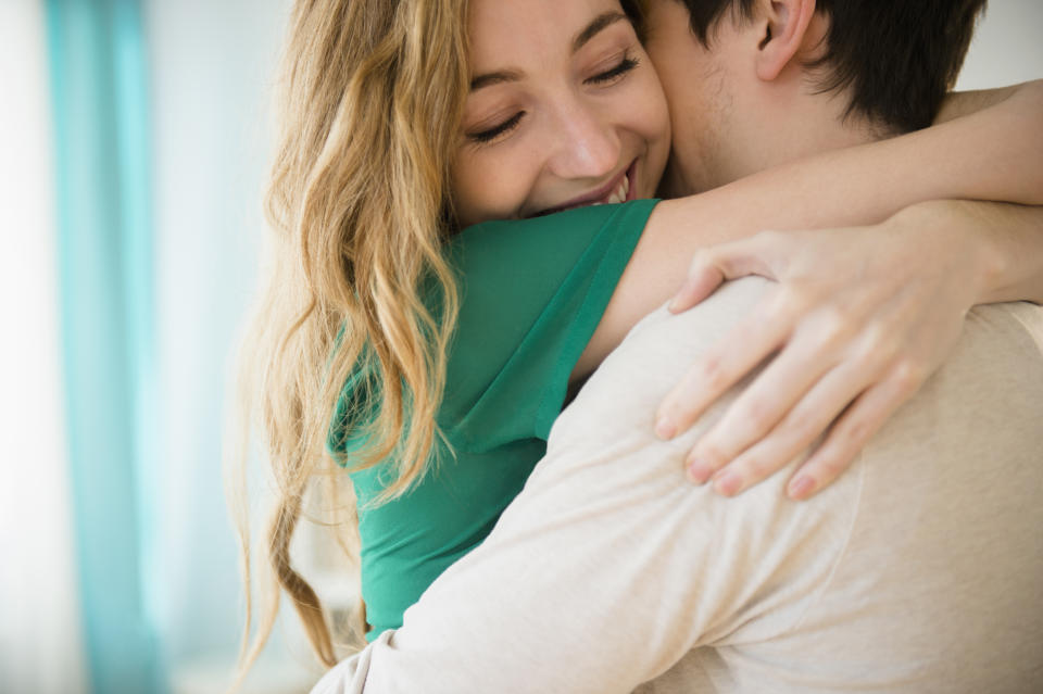 woman hugging man