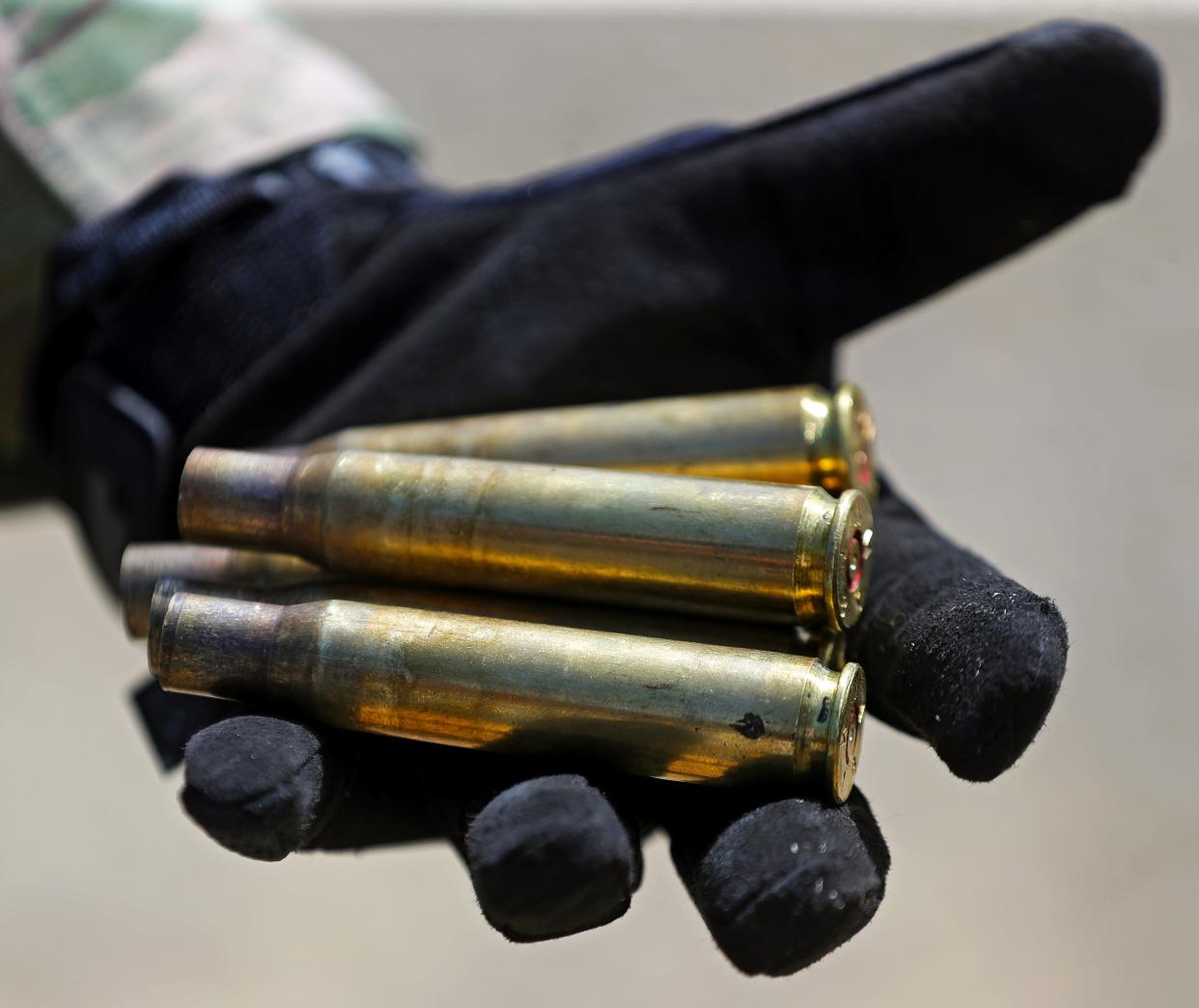 A handful of spent .50-caliber casings will be kept in celebration of the first rounds fired Tuesday, May 7, 2024, on the new machine gun range at Camp James A. Garfield Joint Military Training Center.