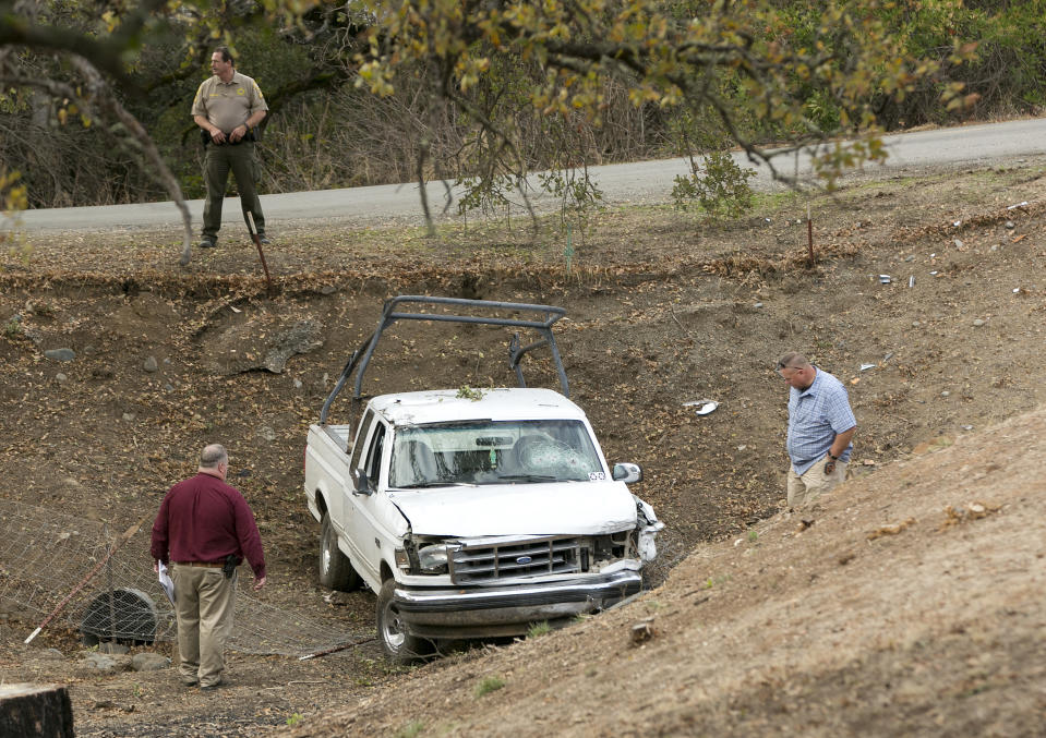 <p>Investigators view a pickup truck involved in a deadly shooting rampage at the Rancho Tehama Reserve, near Corning, Calif., Nov. 14, 2017. (Photo: Rich Pedroncelli/AP) </p>