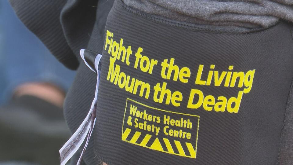 A black arm band worn by an attendee of the Day of Mourning gathering at Windsor's Coventry Gardens, organized by the Windsor and District Labour Council, April 28, 2024.