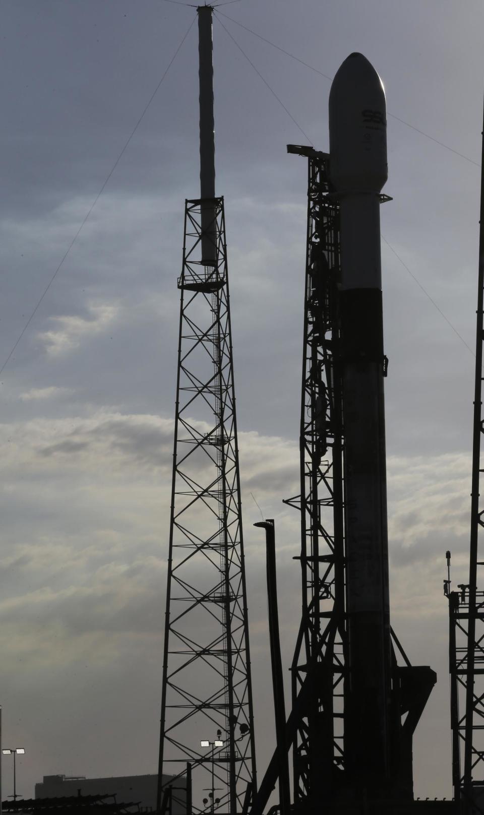 The rocket is seen as it is prepared for launch (AP)