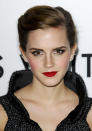 Emma Watson teamed her pillarblock red lips with smokey eyes. [Rex]