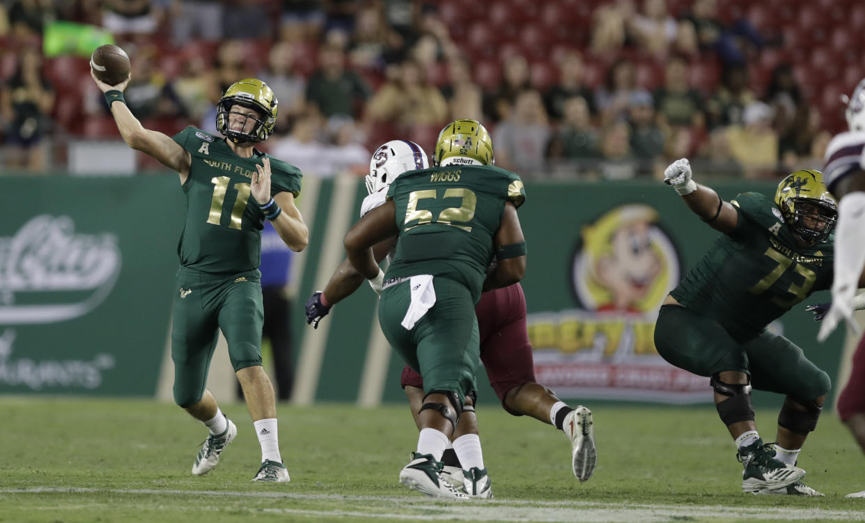 South Florida quarterback Blake Barnett (11) throws a pass against South Carolina State during the second half of an NCAA college football game Saturday, Sept. 14, 2019, in Tampa, Fla. (AP Photo/Chris O'Meara)