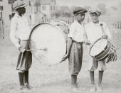 <p>Left to right: George Goldstein, Harold Johnson and Harold Valentine prepare to march through their neighborhood to celebrate the Fourth July, circa 1935. (Photo: FPG/Hulton Archive/Getty Images) </p>