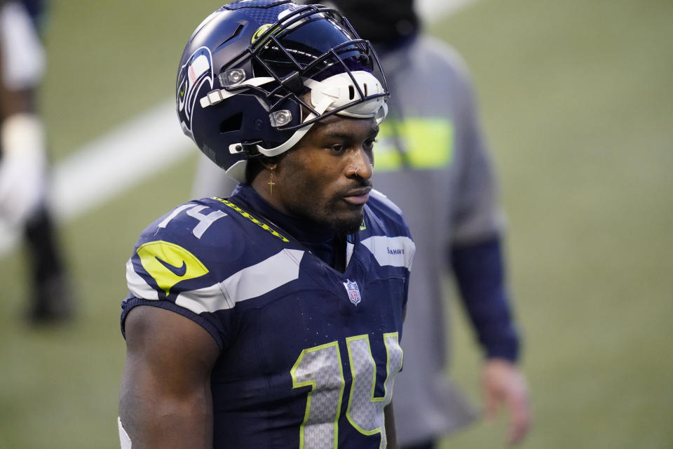 Seattle Seahawks wide receiver DK Metcalf walks off the field after an NFL football game against the New York Giants, Sunday, Dec. 6, 2020, in Seattle. The Giants won 17-12. (AP Photo/Elaine Thompson)