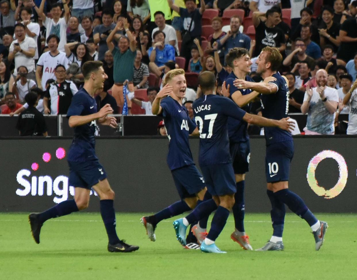 Tottenham Hotspur players congratulate Harry Kane (right) after the striker scored the winning goal in their International Champions Cup match against Juventus at the National Stadium (PHOTO: Zainal Yahya/Yahoo News Singapore)