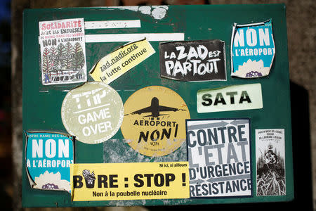 A letter box with stickers "Airport No" is seen at "La Rolandiere" area in the zoned ZAD (Deferred Development Zone) in Notre-Dame-des-Landes, that is slated for the Grand Ouest Airport (AGO), western France, October 17, 2016.REUTERS/Stephane Mahe