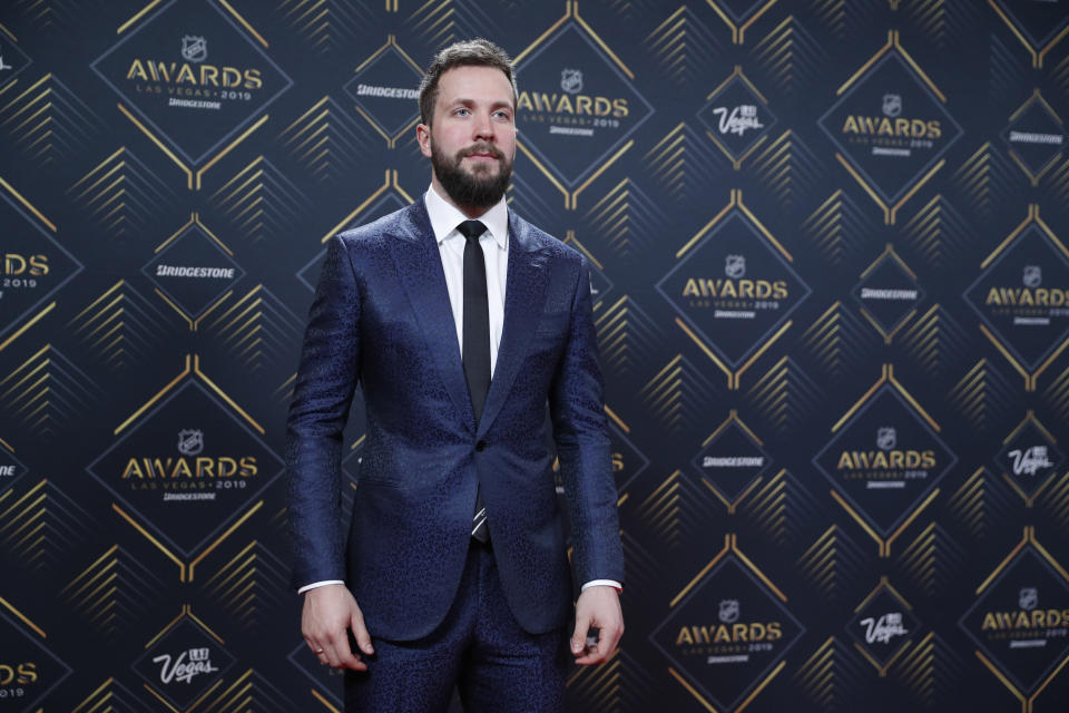 Tampa Bay Lightning's Nikita Kucherov poses on the red carpet before the NHL Awards, Wednesday, June 19, 2019, in Las Vegas. (AP Photo/John Locher)