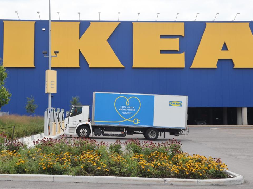  An electric delivery vehicle charging at an Ikea furniture store in Ottawa.