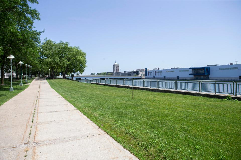 A sidewalk through Davis Park is seen Tuesday, June 14, 2022 in Rockford. A state-funded boat dock and seawall repair project could be coming to the park later this year.