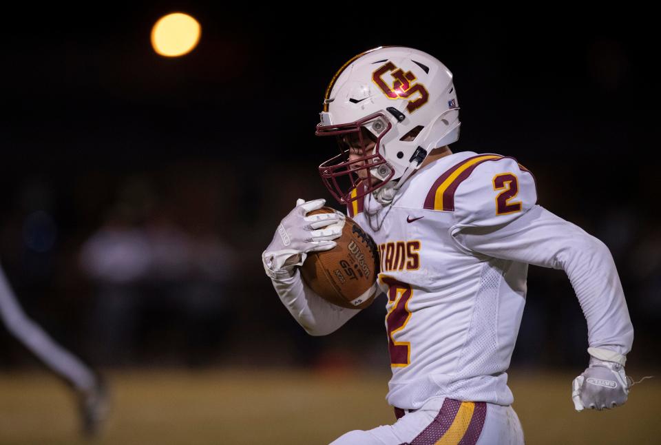 Gibson Southern’s Sean DeLong (2) runs for a touchdown against Boonville during their game at Bennett Field in Boonville, Ind., Friday evening, Oct. 14, 2022.