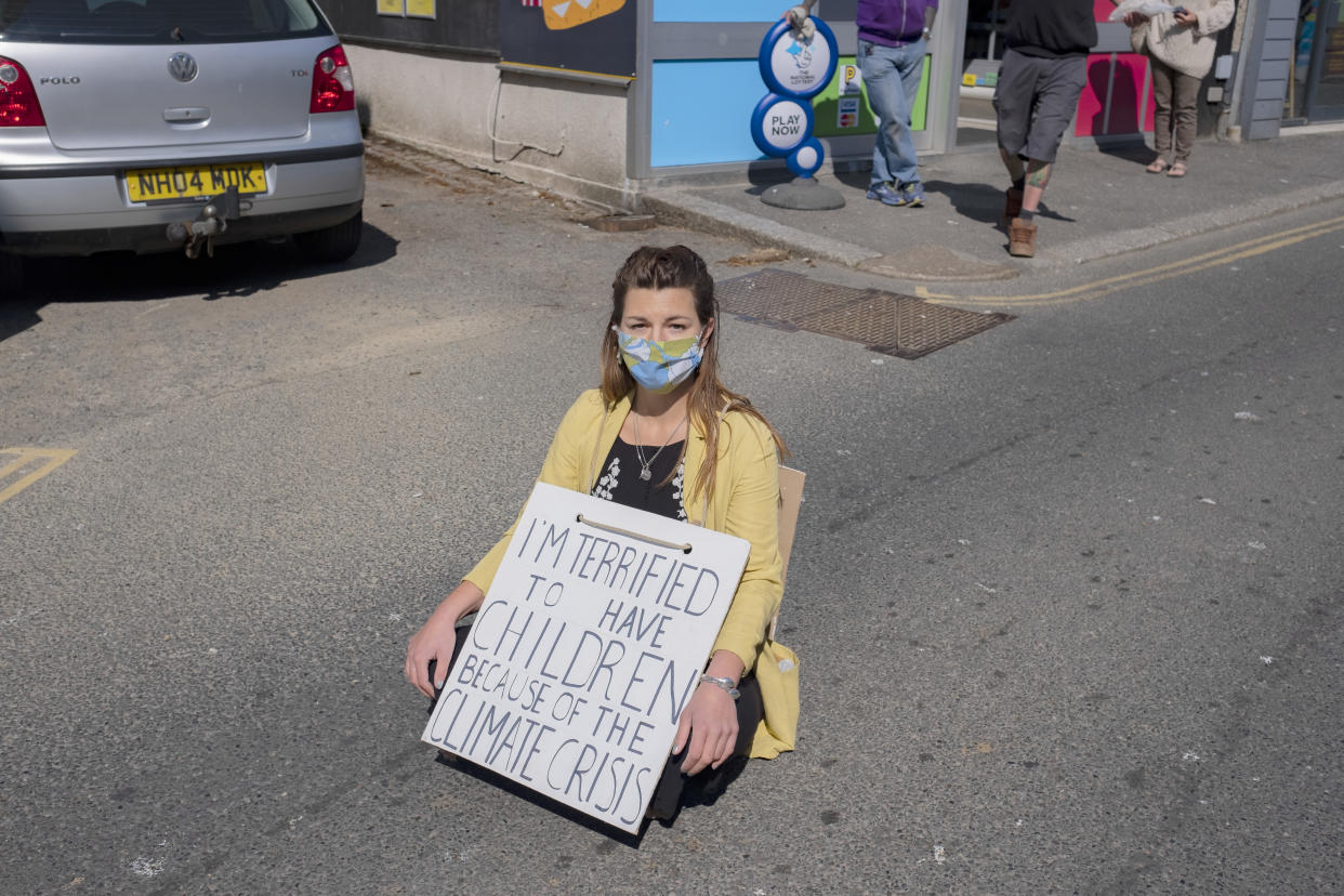 Abbey, a 24 year-old part-time waitress and self-employed dressmaker joined over 200 hundred Extinction Rebellion activists who sat alone in roads blocking oncoming traffic.