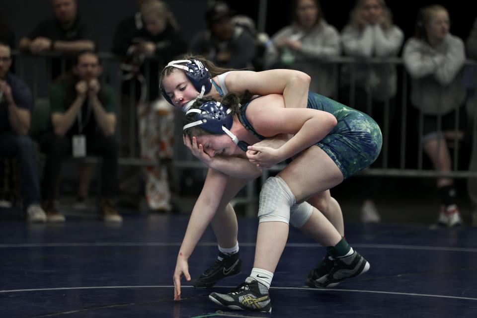 Mountain Crest’s Charley Parker and Snow Canyon’s Lydia White compete in the 4A State Championships at Utah Valley University in Orem on Wednesday, Feb. 14, 2024. | Laura Seitz, Deseret News