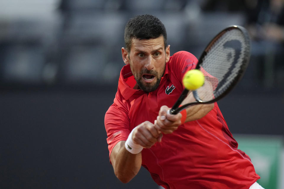 Serbia's Novak Djokovic returns the ball to France's Corentin Moutet at the Italian Open tennis tournament in Rome, Friday, May 10, 2024. (AP Photo/Alessandra Tarantino)