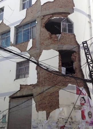 A building is damaged after an earthquake hit Ludian county, Yunnan province August 3, 2014. REUTERS/Stringer