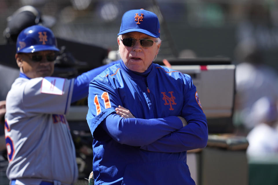 New York Mets manager Buck Showalter watches from the dugout during the fifth inning of the team's baseball game against the Oakland Athletics in Oakland, Calif., Sunday, April 16, 2023. (AP Photo/Jeff Chiu)
