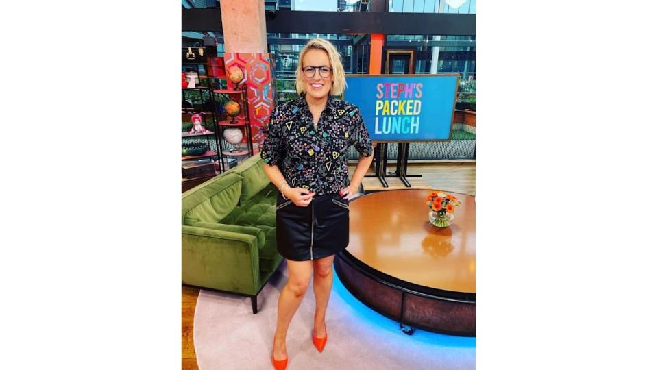 Steph McGovern in shirt and leather skirt