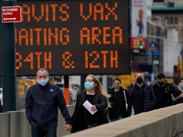 New Yorkers arrive at the Javits Center Covid-19 vaccination center on April 13, 2021 in New York.  (AFP via Getty Images)