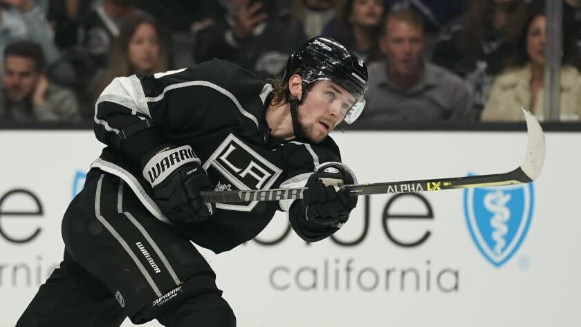 Los Angeles Kings center Adrian Kempe (9) passes during an NHL hockey game against the Seattle Kraken Saturday, March 26, 2022, in Los Angeles. (AP Photo/Ashley Landis)