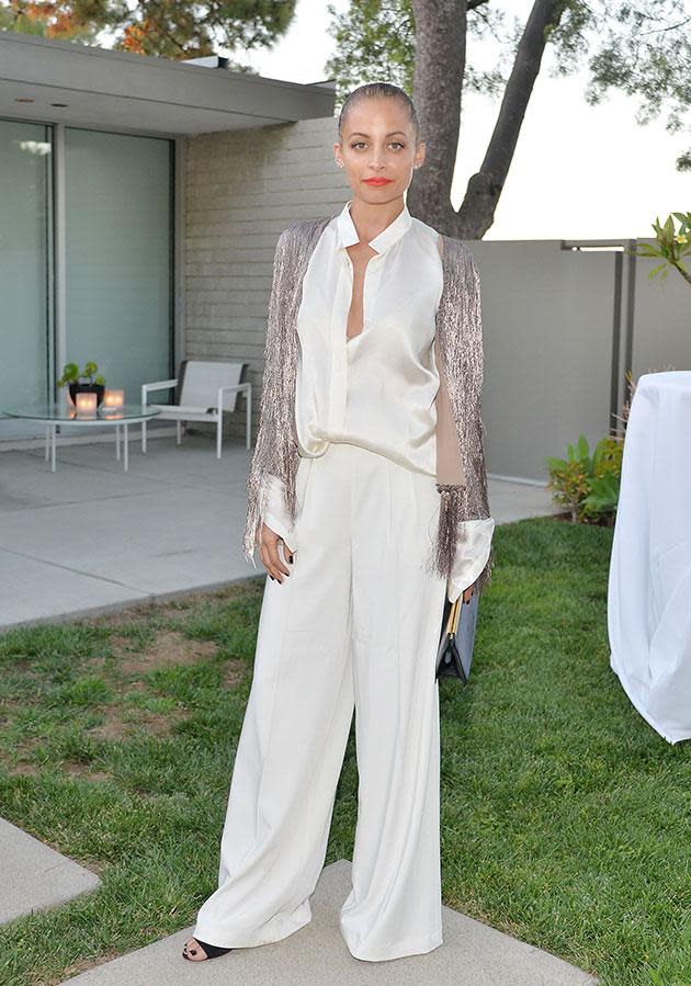 Nicole showed just how far she's come in the style stakes as she celebrated Rachel Zoe's capsule collection in July. She looked chic and demure in a pair of cream trousers with a matching shirt and a glittering jacket.