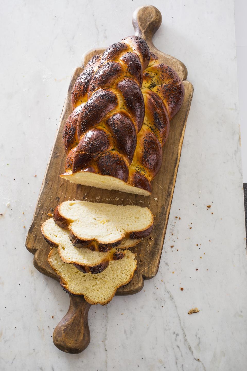 This undated photo provided by America's Test Kitchen in October 2018 shows challah in Brookline, Mass. This recipe appears in the cookbook “Bread Illustrated.” (Carl Tremblay/America's Test Kitchen via AP)