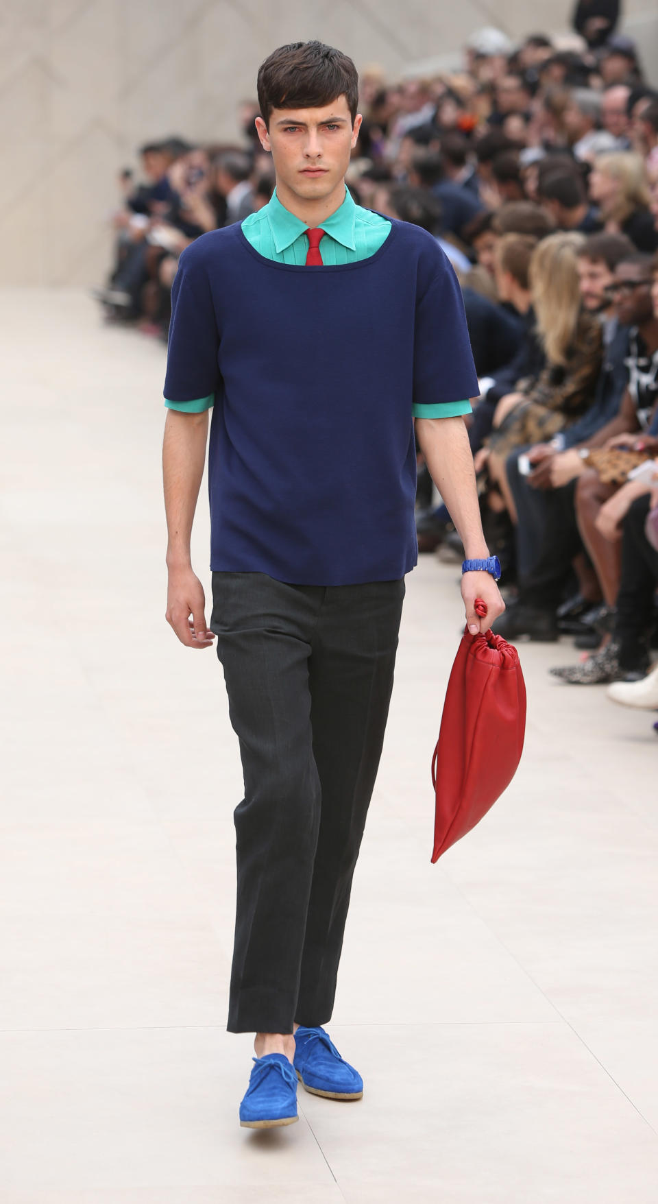 A model wears a creation by Burberry during London Men's spring summer fashion collections 2014, in London, Tuesday, June 18, 2013. (Photo by Joel Ryan/Invision/AP)