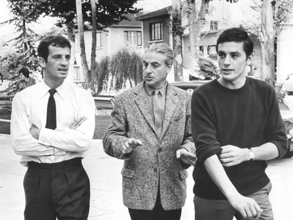 <p>French actors Jean-Paul Belmondo and Alain Delon with director Rene Clement (C) on the set of Clement's movie Paris brule-t-il? (Is Paris Burning?). (Photo by Sunset Boulevard/Corbis via Getty Images)</p>
