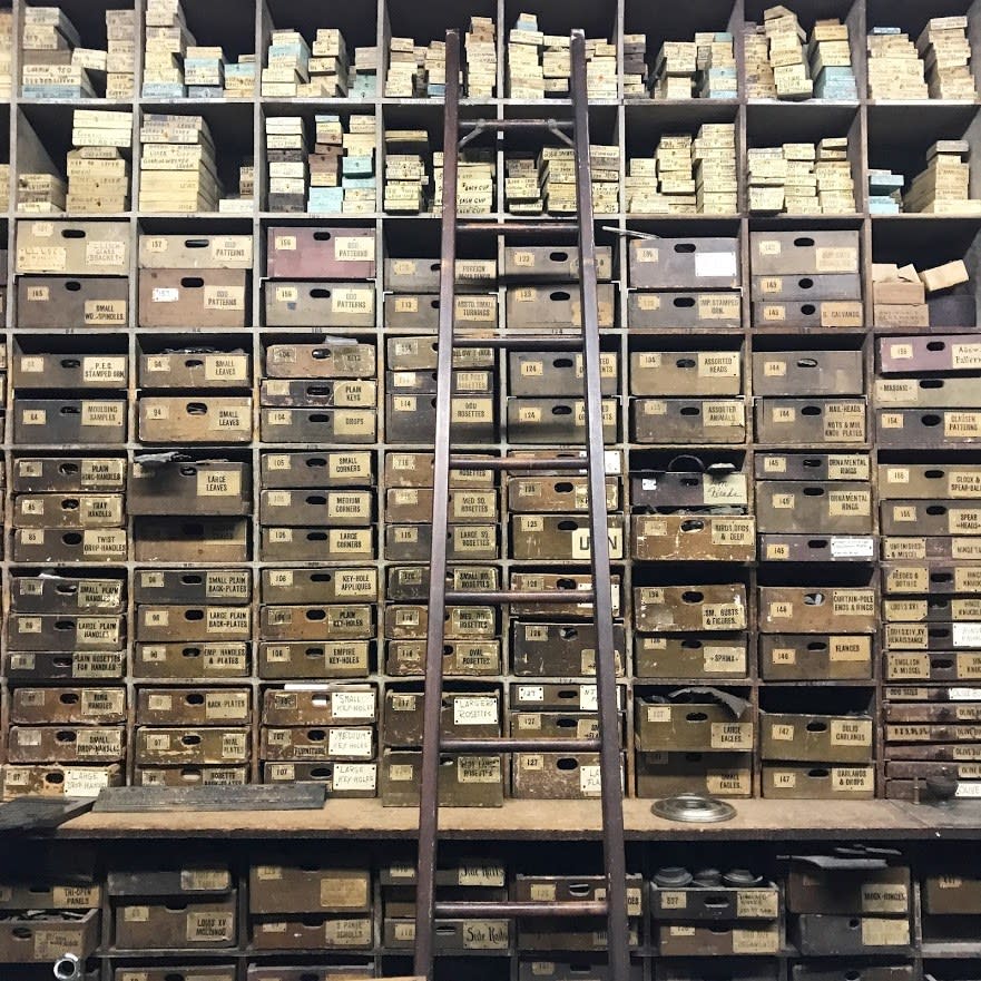Drawers in the company's archive room are filled with old metal molds.