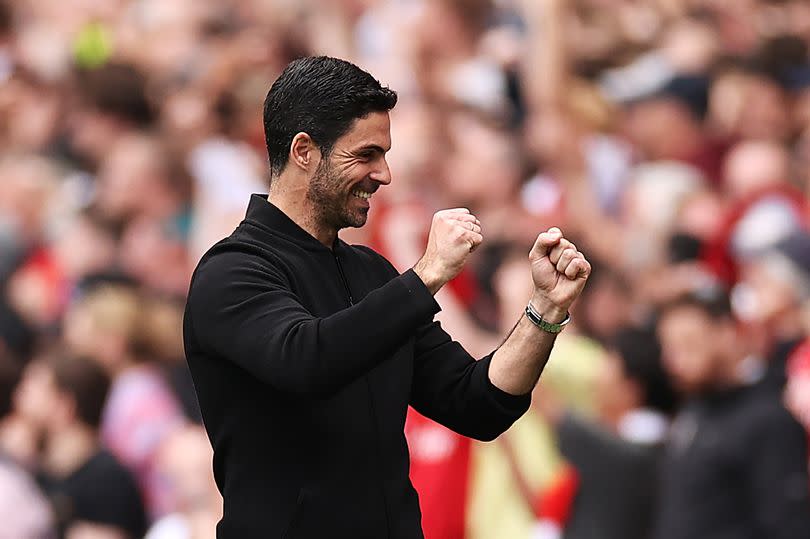 Mikel Arteta, Manager of Arsenal, celebrates his team's first goal scored by Bukayo Saka of Arsenal (not pictured) from a penalty kick during the Premier League match between Arsenal FC and AFC Bournemouth at Emirates Stadium on May 04, 2024 in London, England.