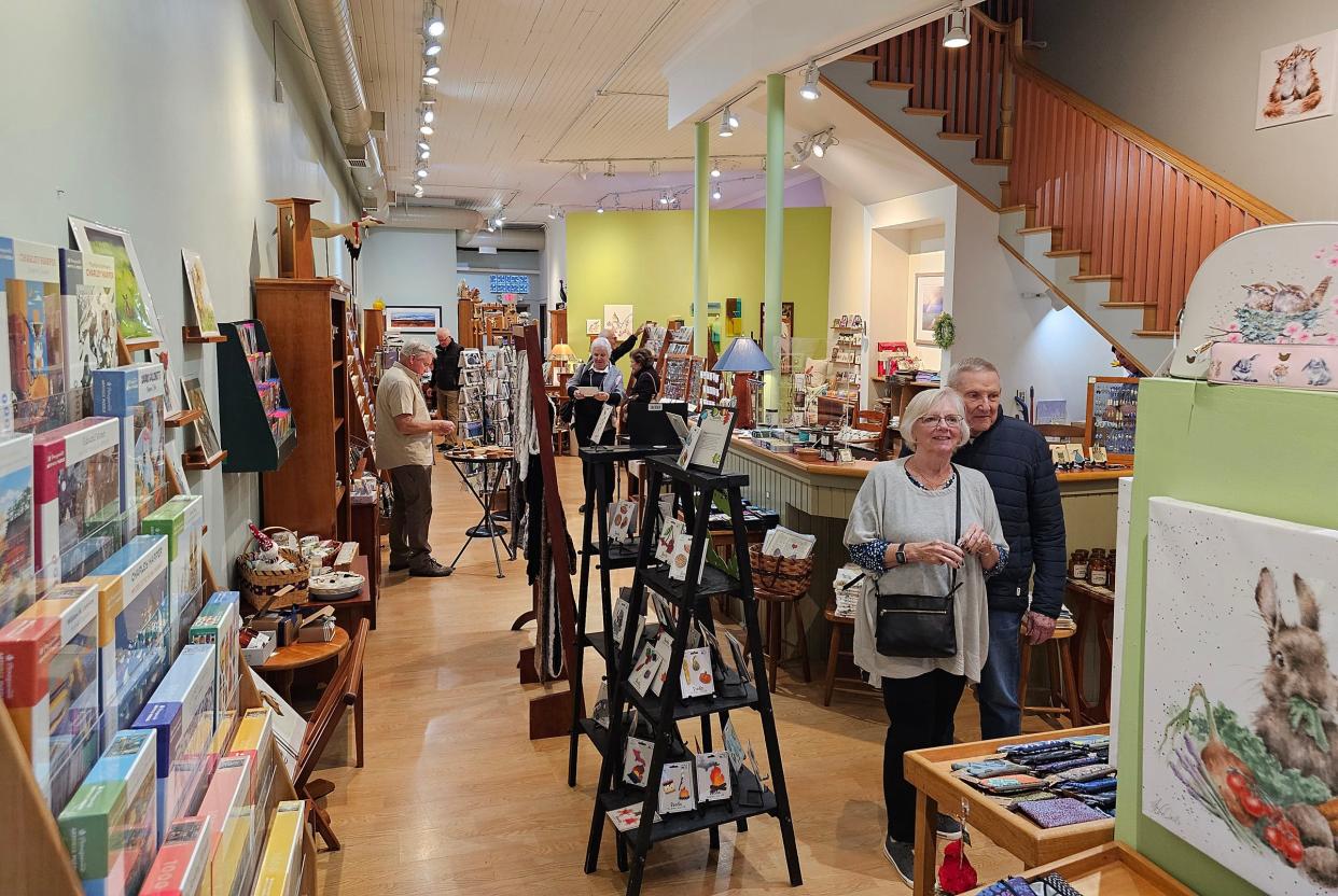 Shoppers browse at Bumble's Dry Goods in Chelsea, which offers a wide variety of products such as greeting cards, ceramics and food products.
