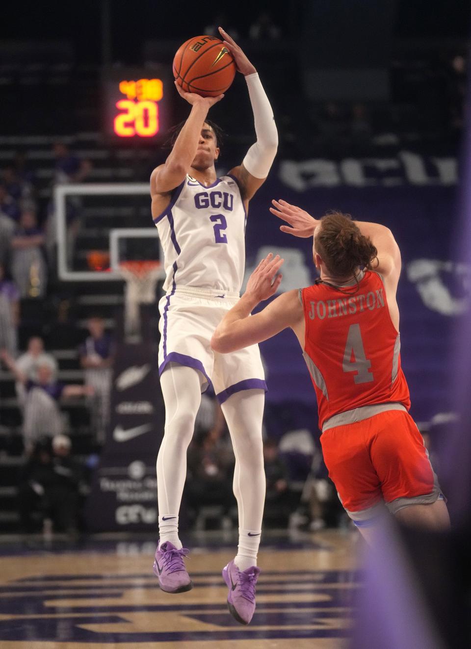 Feb 15, 2023; Phoenix, AZ, USA; GCU Lopes guard Chance McMillian (2) shoots the ball over UT Rio Grande Valley Vaqueros guard Will Johnston (4) at GCU Arena.