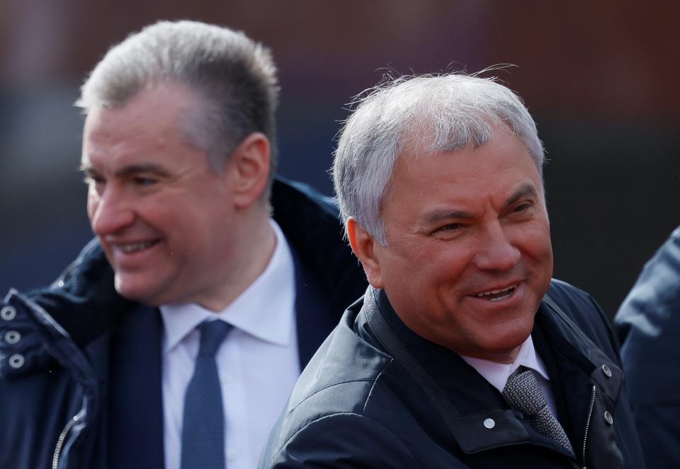 Speaker of Russia’s State Duma lower house of parliament Vyacheslav Volodin (R) and Leonid Slutsky, leader of the Liberal Democratic Party of Russia (LDPR), attend a military parade on Victory Day, (REUTERS)