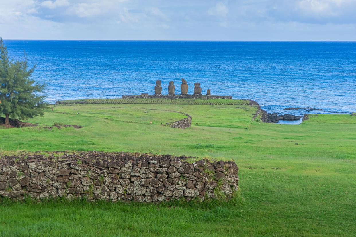 View of Moais -- stone statues of the Rapa Nui culture -- in Easter Island, 3700 km off the Chilean coast in the Pacific Ocean, on March 31, 2020. - Local authorities in Easter Island believe that the spread of the COVID-19 coronavirus is almost contained, but they fear the consequences of the abrupt stoppage of tourism, the economic engine of this volcanic island in Polynesia. (Photo by MIGUEL CARRASCO / AFP) (Photo by MIGUEL CARRASCO/AFP via Getty Images)