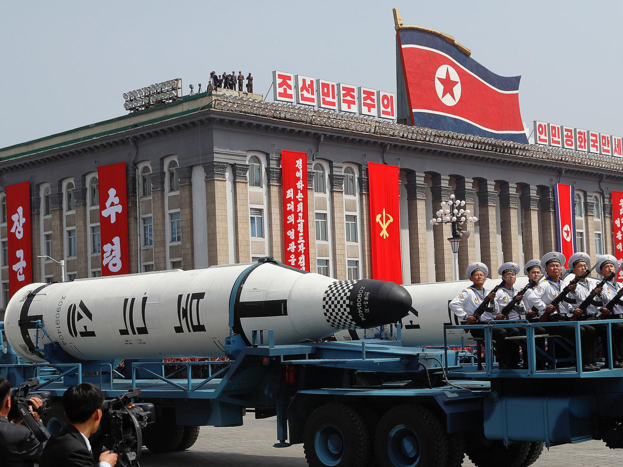 Military vehicles carry missiles with characters reading 'Pukkuksong' during a military parade marking the 105th birth anniversary of Kim Il-sung in Pyongyang on 15 April 2017: EPA