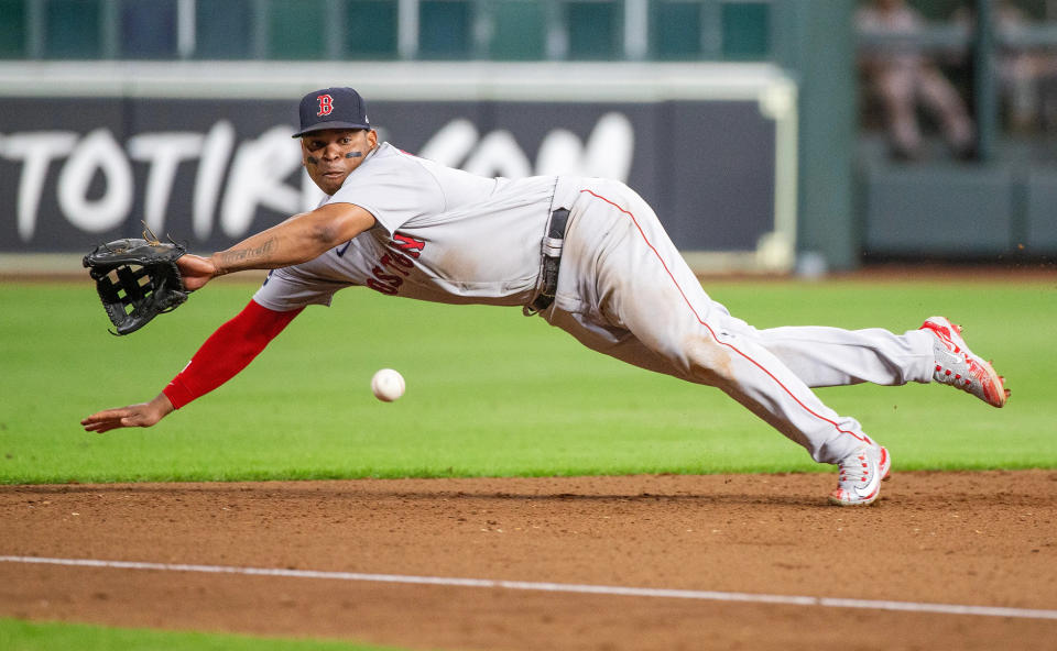 Aug 21, 2023; Houston, Texas, USA; Boston Red Sox third baseman Rafael Devers (11) can not handle <a class="link " href="https://sports.yahoo.com/mlb/teams/houston/" data-i13n="sec:content-canvas;subsec:anchor_text;elm:context_link" data-ylk="slk:Houston Astros;sec:content-canvas;subsec:anchor_text;elm:context_link;itc:0">Houston Astros</a> third baseman <a class="link " href="https://sports.yahoo.com/mlb/players/10183" data-i13n="sec:content-canvas;subsec:anchor_text;elm:context_link" data-ylk="slk:Alex Bregman;sec:content-canvas;subsec:anchor_text;elm:context_link;itc:0">Alex Bregman</a> (2) (not pictured) stand up double line drive in the seventh inning at Minute Maid Park. Mandatory Credit: Thomas Shea-USA TODAY Sports