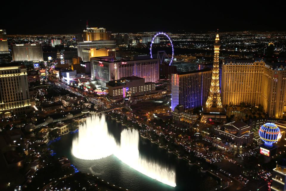 The new High Roller observation wheel takes its place along the skyline of the Las Vegas strip as seen from atop the Cosmopolitan Hotel.