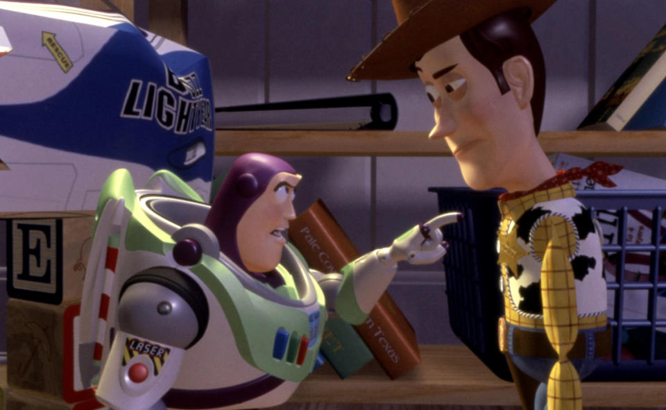 Buzz Lightyear angrily pointing at Woody the Cowboy