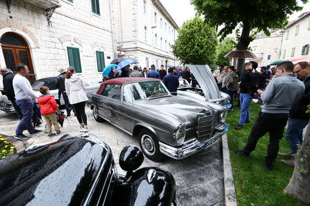 People look at oldtimer Mercedes cars in Imotski, Croatia, May 19, 2019. REUTERS/Antonio Bronic