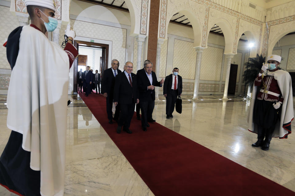 Algerian Foreign Minister Ramtane Lamamra receives United Nations Secretary General António Guterres as he arrives to participate in the Arab Summit as a guest of honor, in Algiers, Algeria, Tuesday, Nov. 1, 2022. Algeria is readying to host the 31st summit of the largest annual Arab conference on Tuesday and Wednesday, as the region battles to find common ground over a series of divisive issues. (AP Photo/Toufik Doudou)