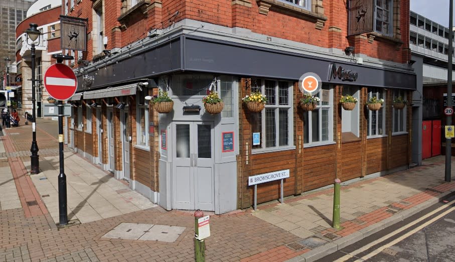 Homophobic abuse was shouted at the gay couple as they stood outside the Missing Bar